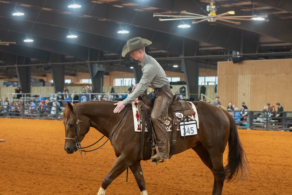 Rider345_Kyle copy Western rider pats horse
