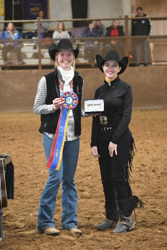 WSF TTU Morgan Stewart from Texas Tech present the award to Michela Long from North Dakota State University 